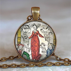May include: A round pendant necklace with a gold-tone chain. The pendant features a vintage illustration of a woman in a red dress with text on banners. The illustration has a medieval theme with figures and architectural elements.