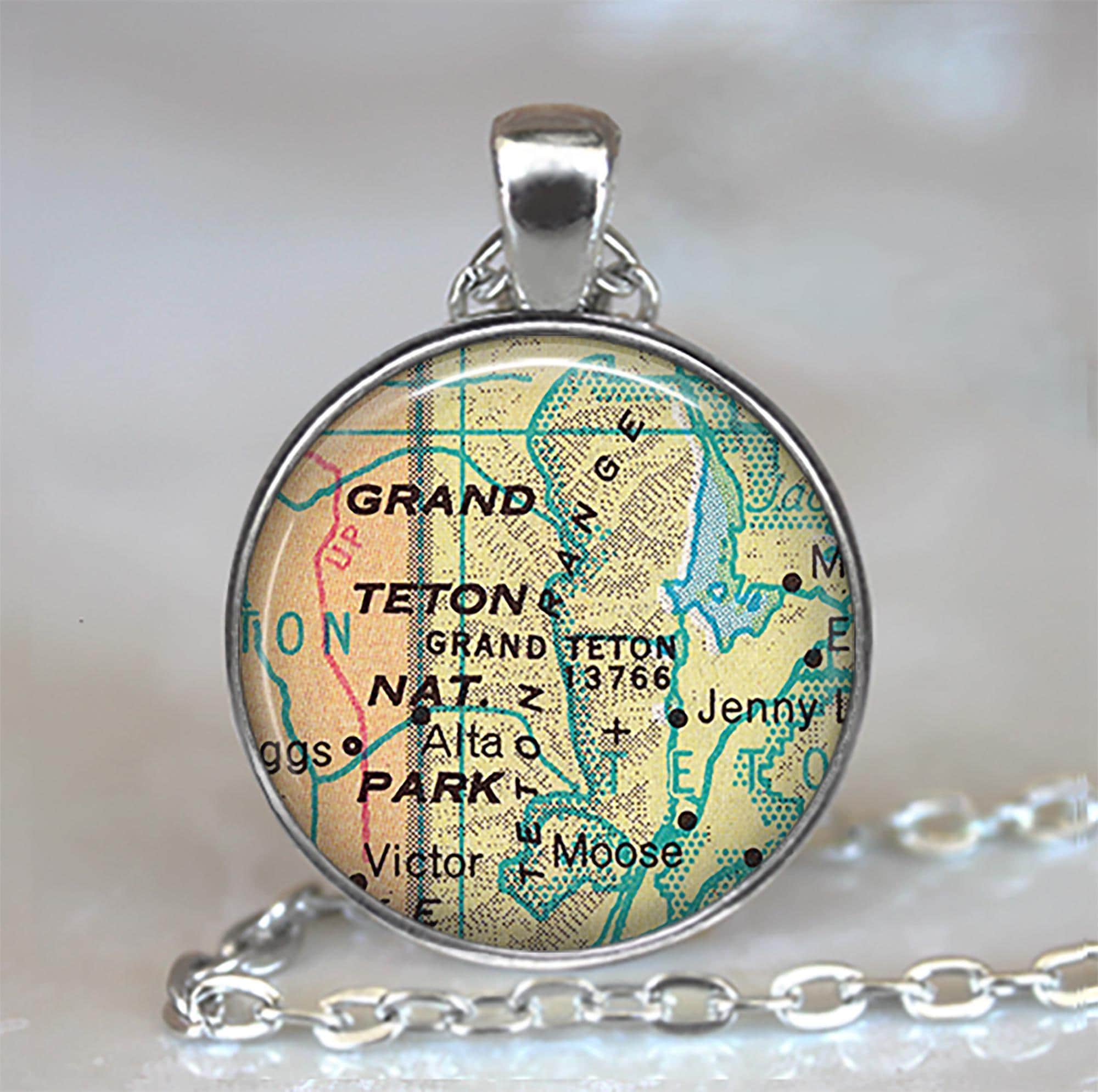 34 Discover Unique Map-Themed Jewelry for Your Next Adventure 2 Grand Teton National Park map necklace, key chain or brooch pin,…