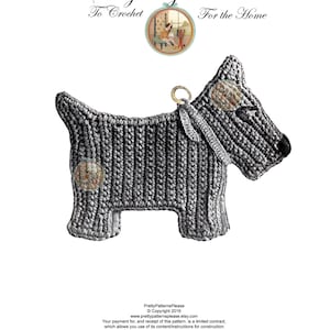 May include: A grey crocheted Scotty dog pot holder with a loop for hanging. The text "The Scotty Dog Pot Holder" is at the top of the image. The text "To Crochet" is below the first line of text. The text "For the Home" is below the second line of text. The text "PrettyPatternsPlease © Copyright 2016 www.prettypatternsplease.etsy.com" is at the bottom of the image.