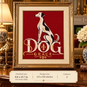Könnte beinhalten: Ein gerahmtes Kreuzstichmuster mit einem weiß-schwarzen Hund über dem Schriftzug DOG GRACE in weißen und goldenen Buchstaben auf dunkelrotem Grund. Ein Etikett darunter gibt eine fertige Größe von 22,4 x 27,2 cm und 3 Farben an.