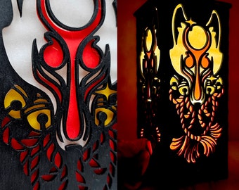 May include: A black wooden lamp with a cutout design of a wolf's head. The wolf's head is illuminated from behind, creating a warm glow. The lamp is a decorative piece with a unique design.