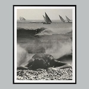 May include: Monochrome framed art print depicting a surfer on a wave, sailing boats at sea, and a person on a pebble beach. The text "it all comes and goes in waves" is printed on the image.