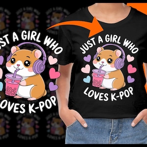 May include: Black t-shirt with a cartoon hamster wearing headphones and holding a bubble tea. The text "Just a girl who loves K-pop" is printed on the shirt.