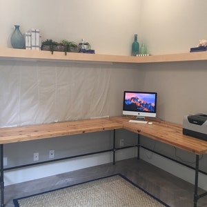 Urban Wood L Shape desk crafted of reclaimed wood with pipe legs