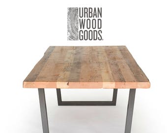 Rustic Farmhouse Wood Dining Table with reclaimed wood top and U shaped steel base.  Choose size, thickness and finish.