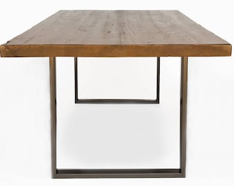 Industrial Dining Room Table made with 1.5" thick reclaimed wood top.  Variety of table bases, sizes and finishes available.