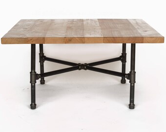 Reclaimed Wood Coffee Table made with reclaimed wood and iron pipe legs.  Choose size, thickness, and wood finish