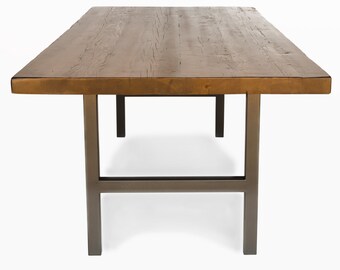 Recycled Wood Table made with 1.5" thick reclaimed wood top and steel H base.  Choose height, size, wood thickness and finish.