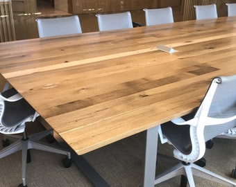 Large Oak Conference Table with knife cut edge, U steel legs. Power not included, inquire for details. Oil finish, clear topcoat.