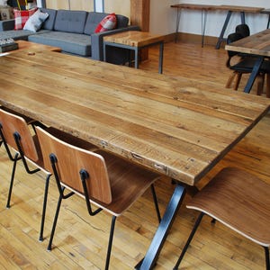 Conference Table made with 2.5 thick reclaimed wood top and steel base. Variety of table bases, sizes and finishes available. image 2