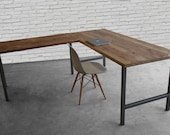 Custom desk made in L shape with reclaimed wood and hand welded steel legs