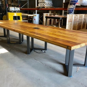 Reclaimed wood Conference table in 2.5" thick wood & steel base. Power/outlet installation avail