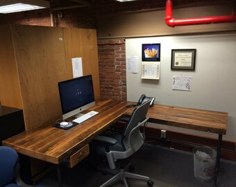 Solid Wood L desk with iron pipe legs and reclaimed wood top in choice of size, height and finish.