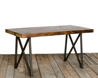 Reclaimed Wood Dining Table with 1.5" reclaimed wood top and our modern monarch style steel legs.  Choose size and finish.