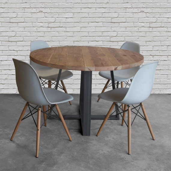 Round dining table 2024 with metal base