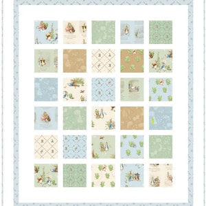 May include: A patchwork quilt featuring a repeating pattern of squares with illustrations of rabbits and floral designs. The quilt has a light blue border with a delicate pattern. The squares have various pastel colors, including blue, green, and beige.