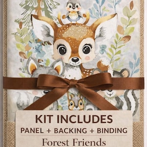 May include: A baby quilt panel kit featuring a watercolor illustration of forest animals, including a deer, squirrel, and bird. The kit includes panel, backing, and binding, tied with a brown ribbon. The text "Forest Friends Baby Quilt Panel Kit" is visible.