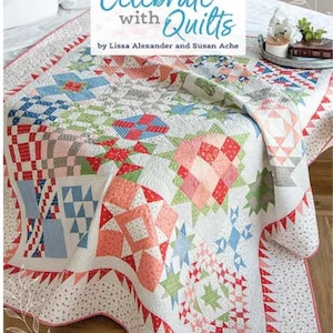 May include: A colorful quilt with a variety of geometric patterns, including stars, squares, and triangles. The quilt features a mix of pastel colors, including pink, blue, green, and red. The text "Celebrate with Quilts" is visible at the top.