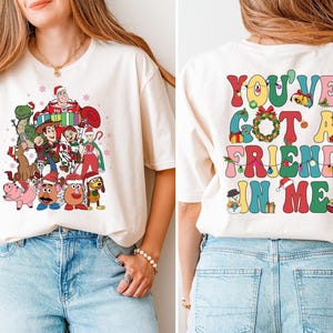 Toy Story Christmas Sweatshirt, Disney You've Got A Friend T-Shirt, Xmas Disneyland Holiday Lights Sweater, Woody & Buzz Xmas Hoodie image 3