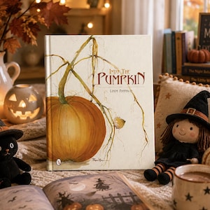 May include: A hardcover book titled Into The Pumpkin by Linda Franklin with a white cover featuring a large orange pumpkin illustration with green vines. The book is positioned upright, displaying the title in brown text and the author's name below.