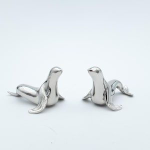 Vintage sigillknivstöd | Silverfärgad metall, par | Borddekoration med djurmotiv för skandinavisk matsal