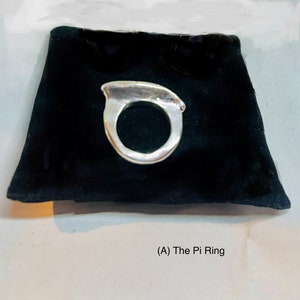 May include: A silver ring shaped like the mathematical symbol for pi, resting on a black velvet pouch. The text (A) The Pi Ring is visible below the pouch.