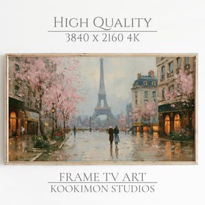 May include: A framed painting of a Parisian street scene with the Eiffel Tower in the background. The artwork features soft colors, with pink cherry blossoms and reflections on the wet pavement. The text "HIGH QUALITY 3840 x 2160 4K" and "FRAME TV ART KOOKIMON STUDIOS" are visible.