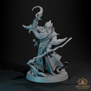May include: A detailed miniature figure of a wizard with a long beard, holding a staff and a curved object. The figure is wearing a long coat with intricate designs and stands on a circular base. The figure is gray.