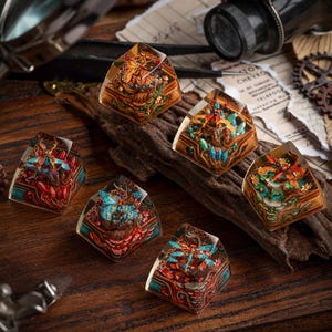 May include: Six artisan mechanical keyboard keycaps featuring intricate, miniature 3D dioramas encased in clear resin. Each keycap displays detailed insects like butterflies and dragonflies, surrounded by colorful flora, crystals, and textured wood-like bases.