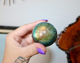 Labradorite Crystal Sphere With Shimmering Flashes Of Blue, Green, And Gold, Polished and Set on a Stand – You Choose Your Unique Piece