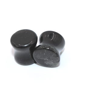 Double Flare Black Tourmaline Plugs Double Flare Black Tourmaline Stone Plugs – Polished Crystal Gauges 5mm-20mm