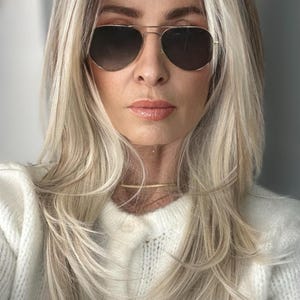 22 Inch Layered Cool Blonde Lower Density 13x6 Synthetic Heat Resistant Lace Front/ Partially Hand Tied Wig (Customised)