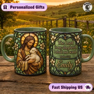 May include: Two ceramic mugs with a green stained glass aesthetic. One mug features a depiction of a bearded figure holding a lamb. The other mug displays the text 'The Lord is my shepherd, I shall not want. Psalm 23:1' and the name 'Emily'.