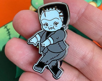 Boris the Wee Monster Babe Pin - Spoopy Glow-in-the-Dark Kewpie hard enamel badge by Stacey Martin Tattoos
