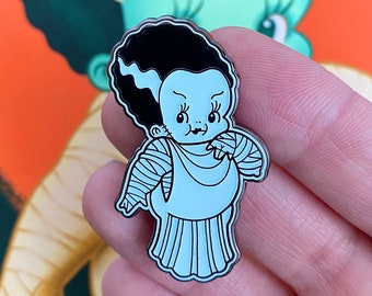 Ellie the Wee Monster Babe Pin - Spoopy Glow-In-The-Dark Kewpie hard enamel badge by Stacey Martin Tattoos