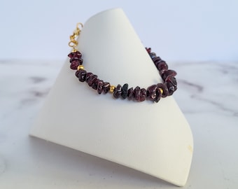 Garnet bracelet with dark wine red garnet chips and gold beads