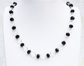 Black crystal and silver necklace