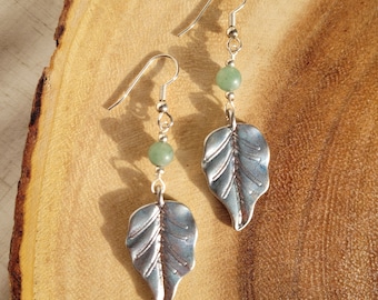 Jade beaded earrings with silver leaf pendants and silver accents