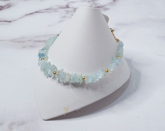 Aquamarine bracelet with icy blue aquamarine chips and gold beads