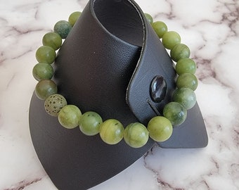 Green gemstone and lava stone diffuser bracelet, claspless bracelet