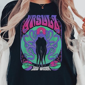 May include: A set of three ceramic mugs with a speckled, matte finish. Each mug features a different color: light blue, cream, and gray. The mugs have a simple, modern design and a comfortable handle. Perfect for coffee or tea.