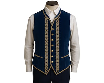 May include: A navy blue velvet vest with gold trim and buttons. The vest features intricate gold braid detailing down the front and around the edges. The vest is displayed on a mannequin, paired with a white dress shirt.
