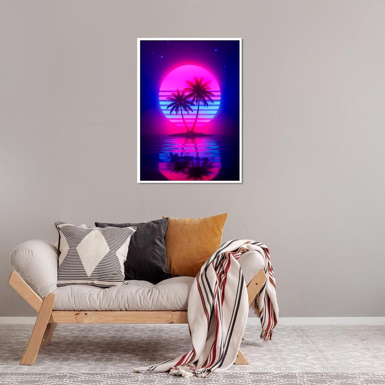 May include: A framed art print featuring a vibrant sunset scene. The artwork showcases a large pink and blue sun, two palm trees, and their reflection in the water. The color palette includes shades of pink, blue, and black, creating a retro aesthetic.