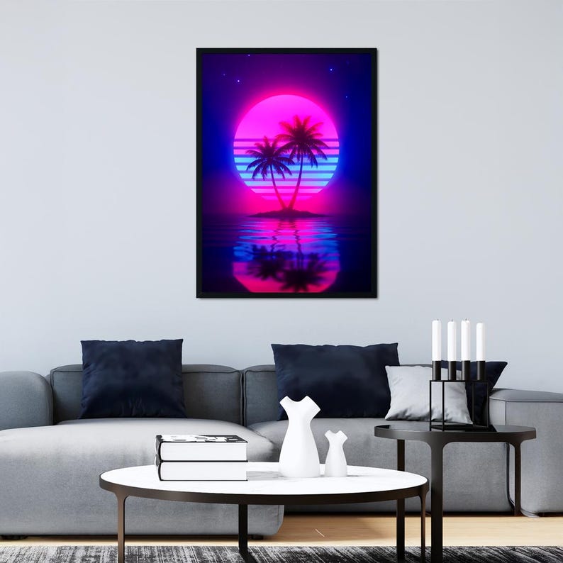 May include: A framed art print featuring a vibrant neon sunset scene. The artwork depicts two palm trees on a small island, reflected in the water, with a large pink and blue sun in the background. The overall aesthetic is reminiscent of retro synthwave art.