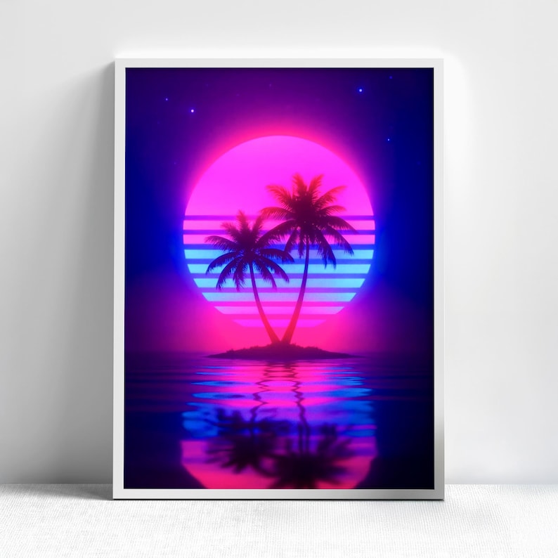 May include: A framed art print featuring a retro-style tropical scene. Two silhouetted palm trees stand on a small island, reflected in the water below. A vibrant pink and blue sun sets in the background, with a dark blue sky and stars.
