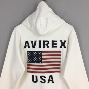 Sudadera con capucha y cremallera blanca vintage Avirex USA, talla grande, con bordado de la bandera estadounidense, suéter militar de la USAF (Fuerza Aérea de EE. UU.), talla L. imagen 9