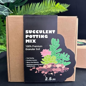 May include: A brown cardboard box with a black label that reads "SUCCULENT POTTING MIX." The label features a graphic of succulents and soil, and lists features like fast rooting and worry-free watering. The box contains 2.5 lbs of soil.
