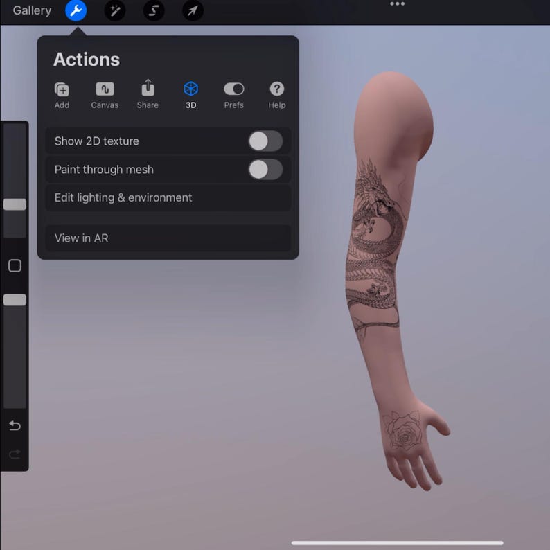 May include: A digital 3D model of an arm displayed in a software interface with an Actions menu visible. The arm features a detailed black line art dragon tattoo extending from the shoulder to the forearm and a rose tattoo on the back of the hand.