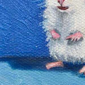 May include: An oil painting on canvas featuring a white hamster with pink paws and nose, depicted against a vibrant blue background. The textured brushstrokes highlight the animal's fur, small dark eyes, and upright posture in this detailed artwork.