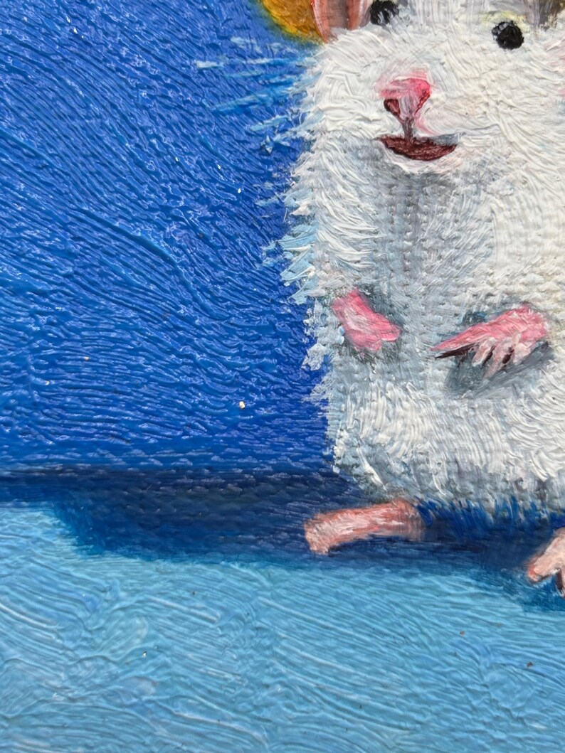 May include: An oil painting on canvas featuring a white hamster with pink paws and nose, depicted against a vibrant blue background. The textured brushstrokes highlight the animal's fur, small dark eyes, and upright posture in this detailed artwork.